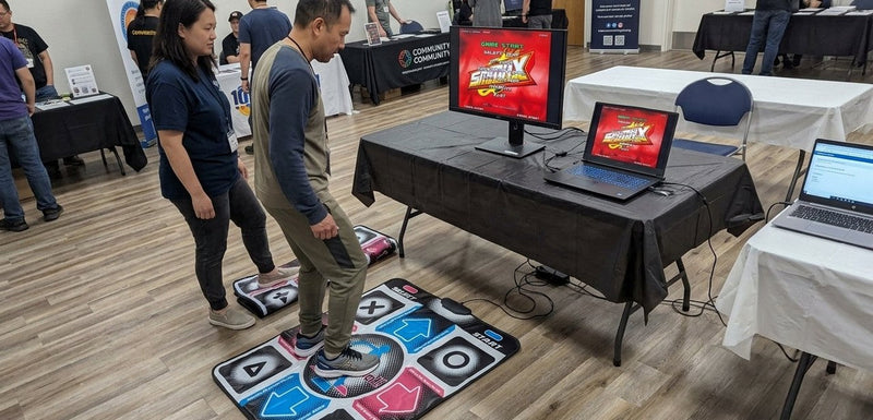 Example dance game setup: two dance pads in front of a screen