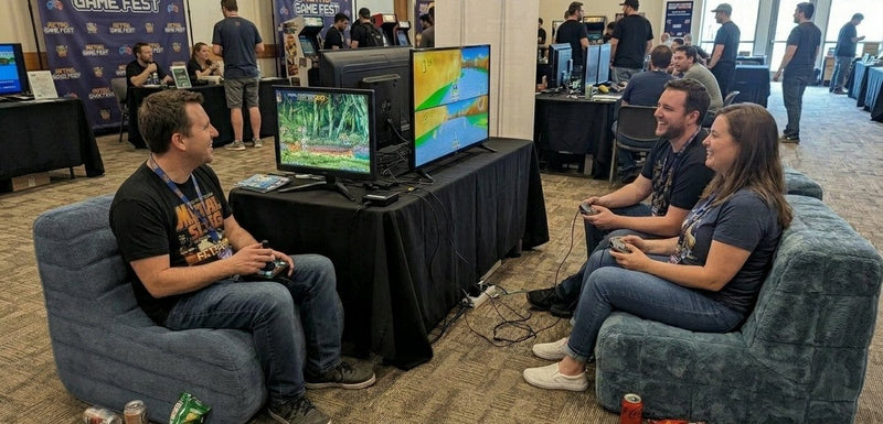 Example couch co-op setup: bean-bag chairs facing two retro game screens
