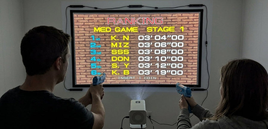Example light-gun setup: two players aiming at a projected screen