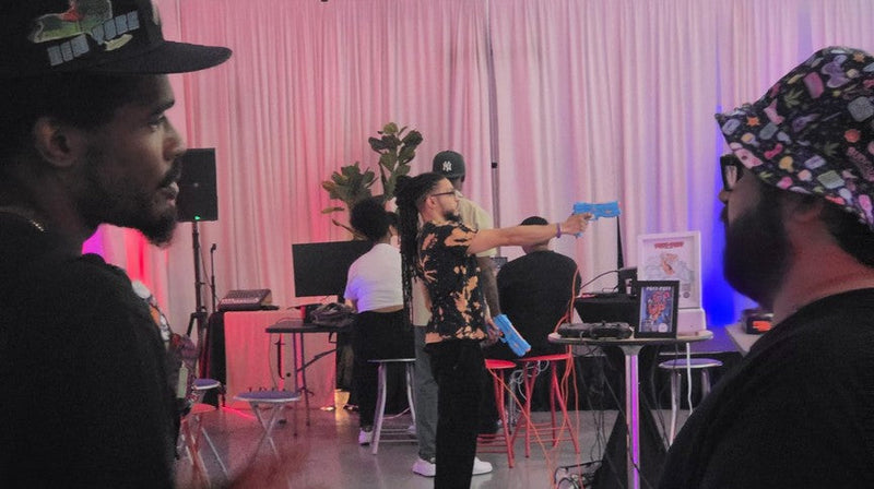 A guest playing a light-gun game at Budcade's Trends LIC launch night
